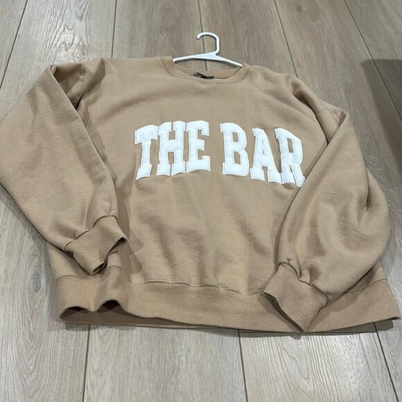 The Bar Tops - The bar sweatshirt in tan with white letters!